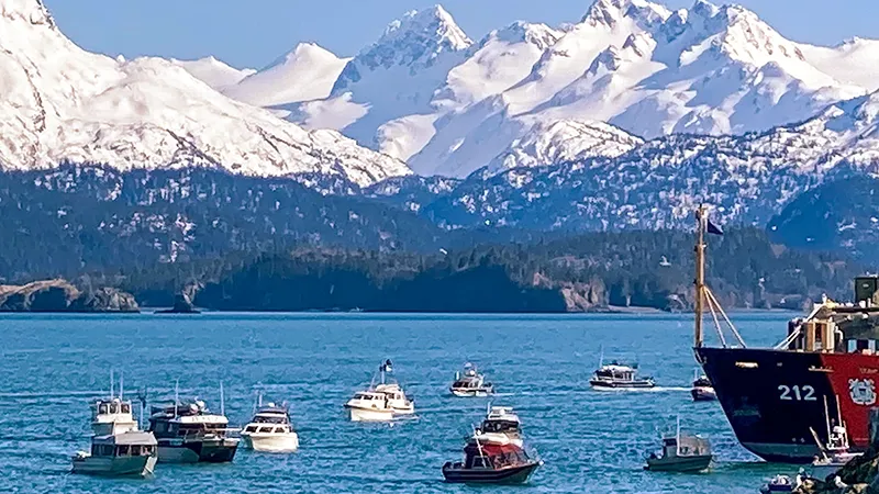 Boats and harbor in Homer, Alaska with Kachemak Bay in background